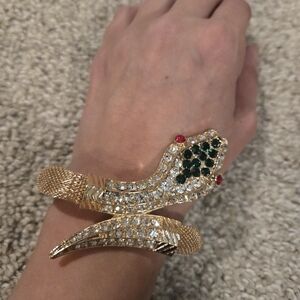 Elegant Gold Snake Bracelet with Green and Red Accents